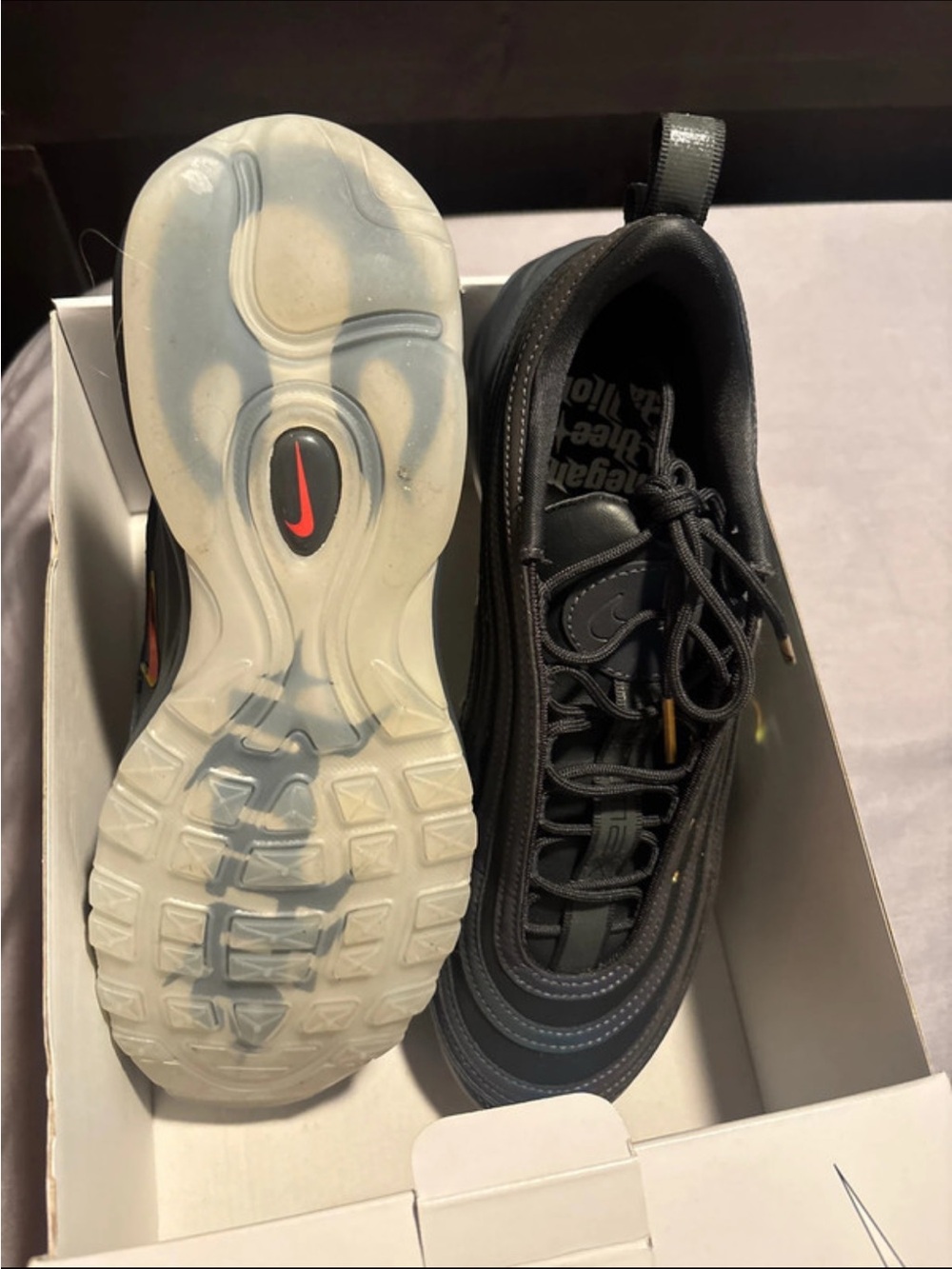Nike Men’s Black Sneakers with Translucent Sole and Red Swoosh